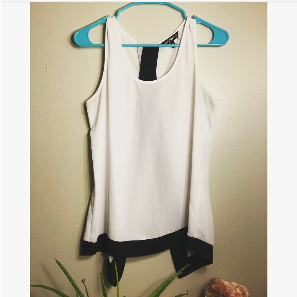 Express • slit-back white blouse, black trimming